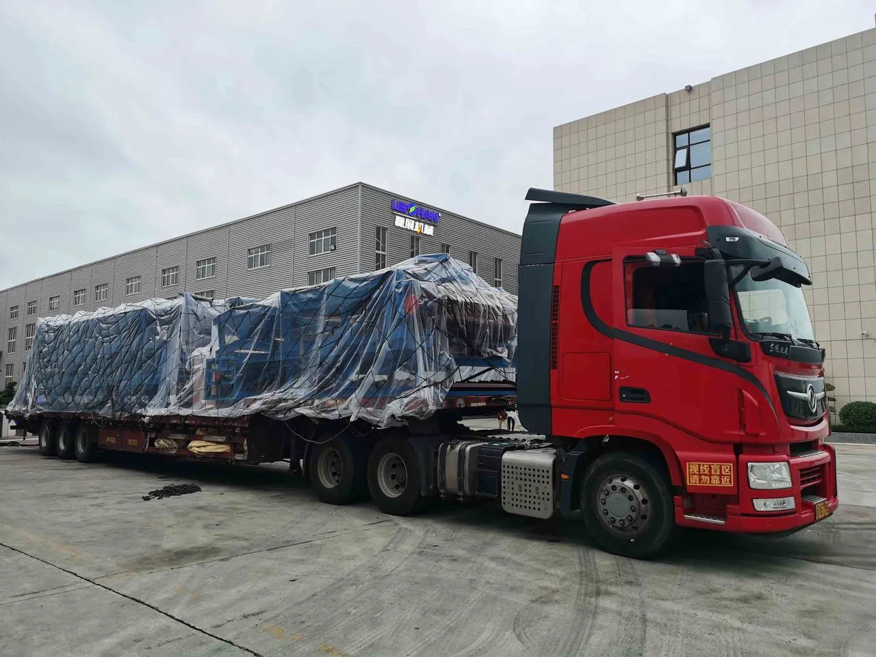 Flatbed truck ready to haul steel, lumber and machinery freight